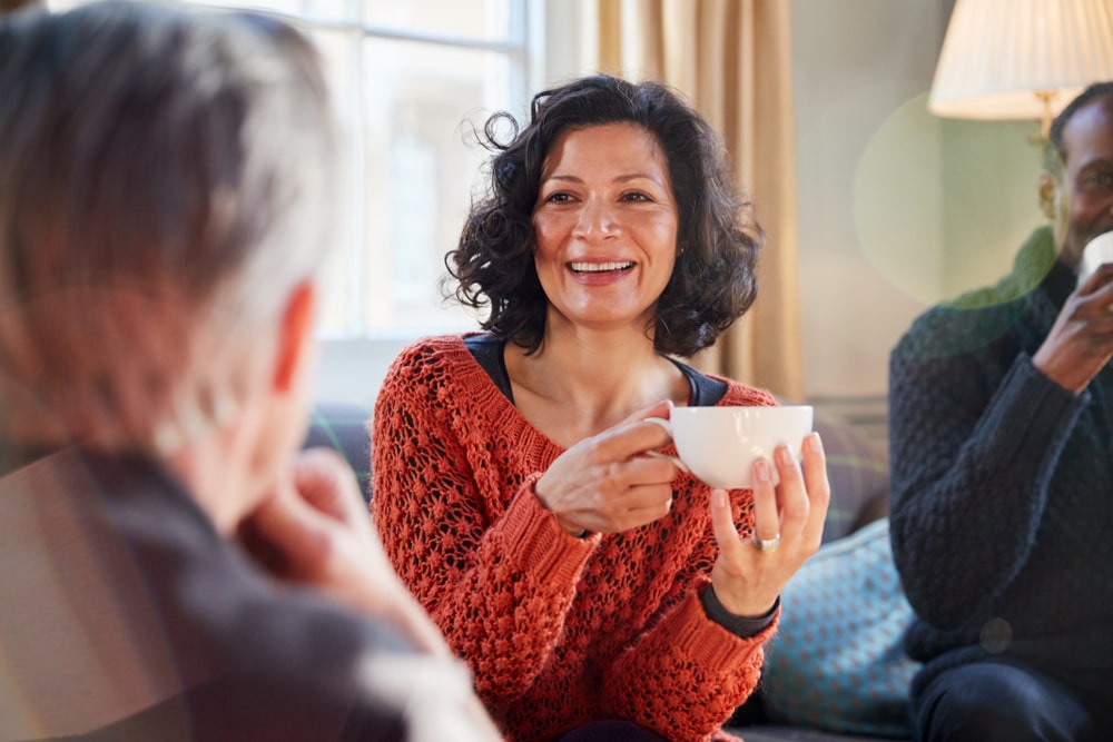 Middle Aged Woman Meeting Friends