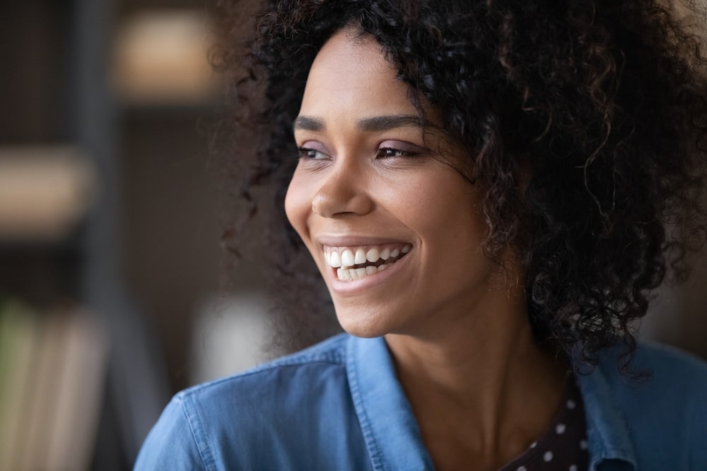 Beautiful young curly haired woman