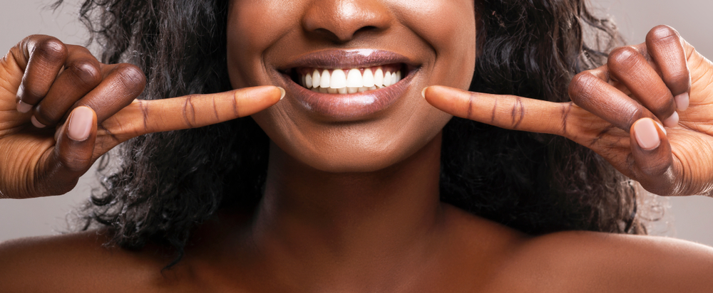 Orthodontic,Concept.,Unrecognizable,African,American,Girl,Pointing,At,Her,Healthy