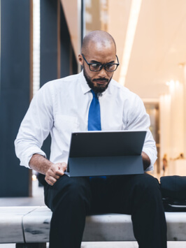 Occupied bald and bearded African American boss