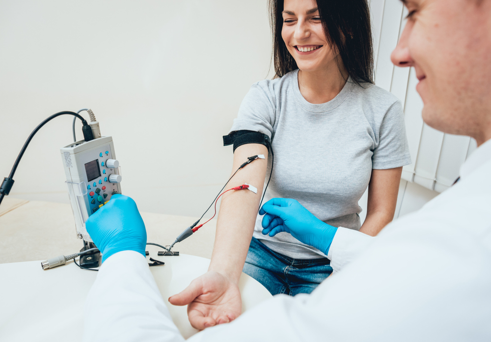 Patient nerves testing using electromyography. Medical examination. EMG