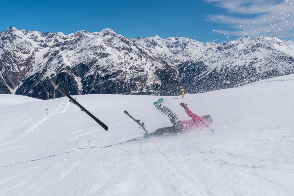 Woman,Skier,Accident,Crash,On,A,Ski,Slope,With,Ski