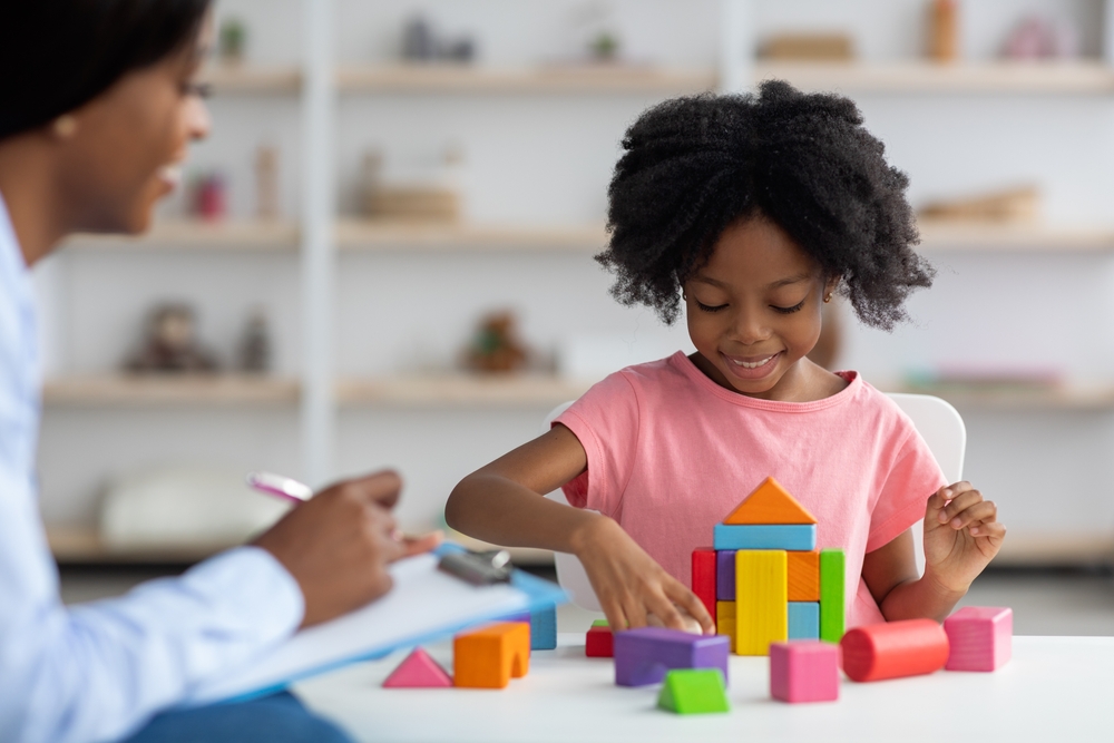 A child being observed for developmental delays