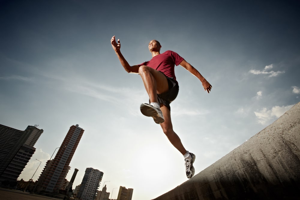 athlete running in Havana, Cuba. Horizontal shape