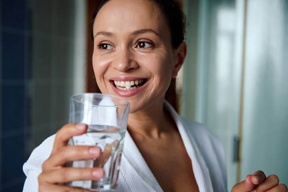 Close-up portrait of a beautiful happy multi-ethnic middle-aged woman smiling