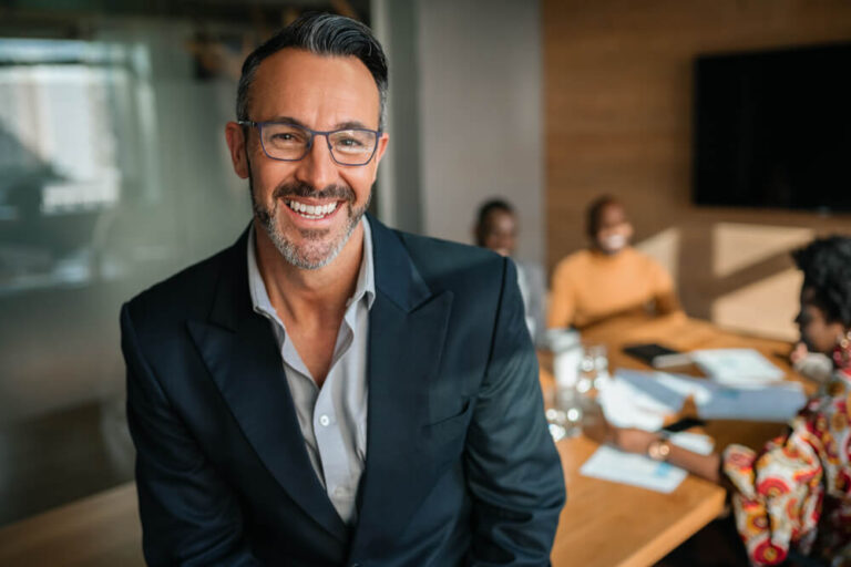 Portrait of smiling handsome businessman