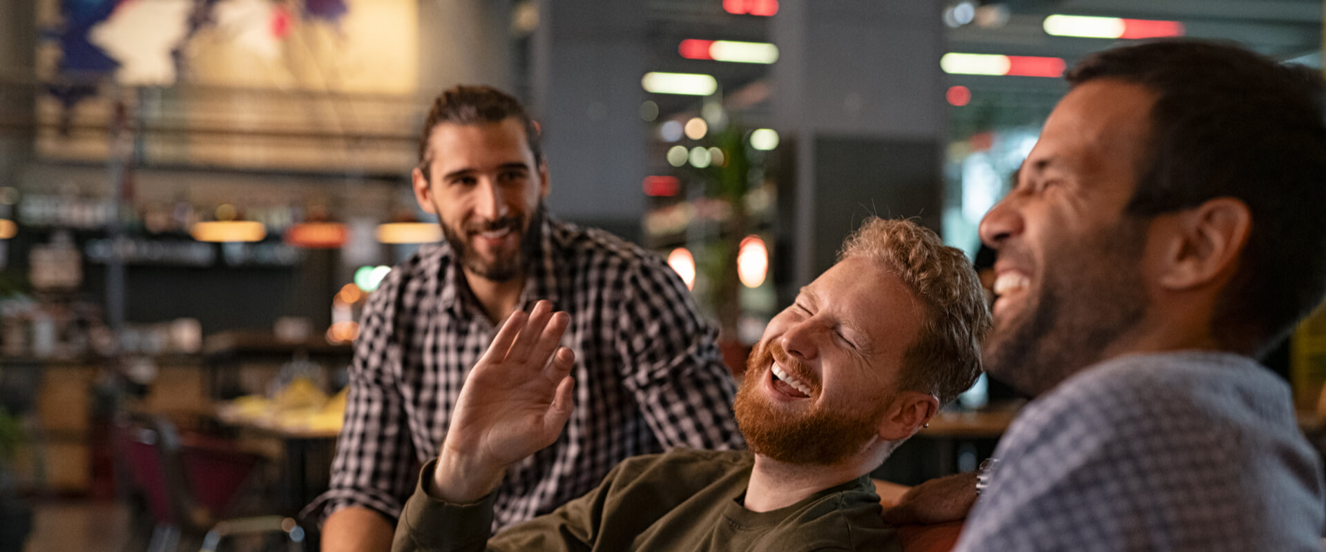 Group of three best friends laughing and enjoying