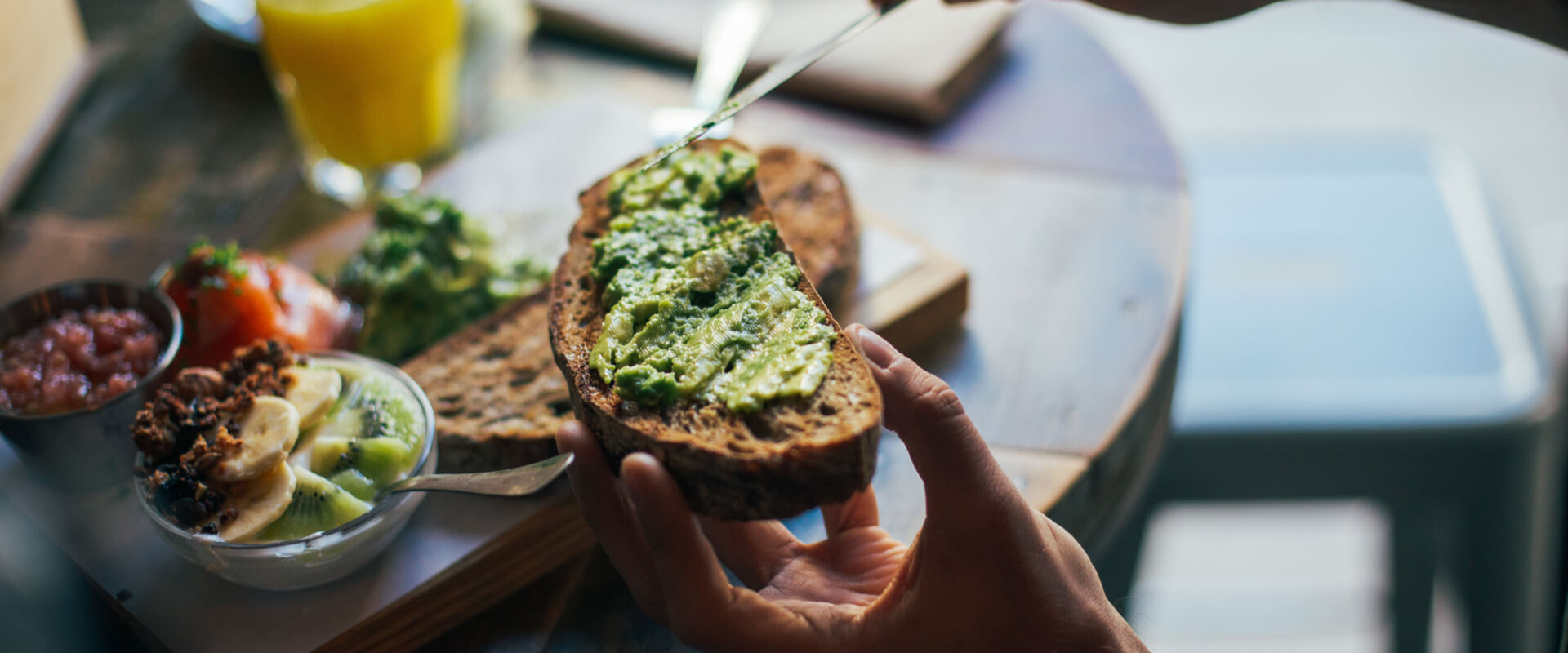 Soft focus shot of man having delicious huge breakfast