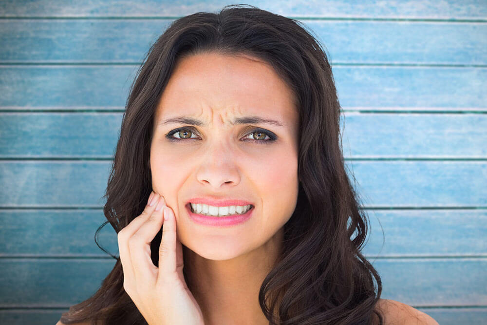 Woman having toothache