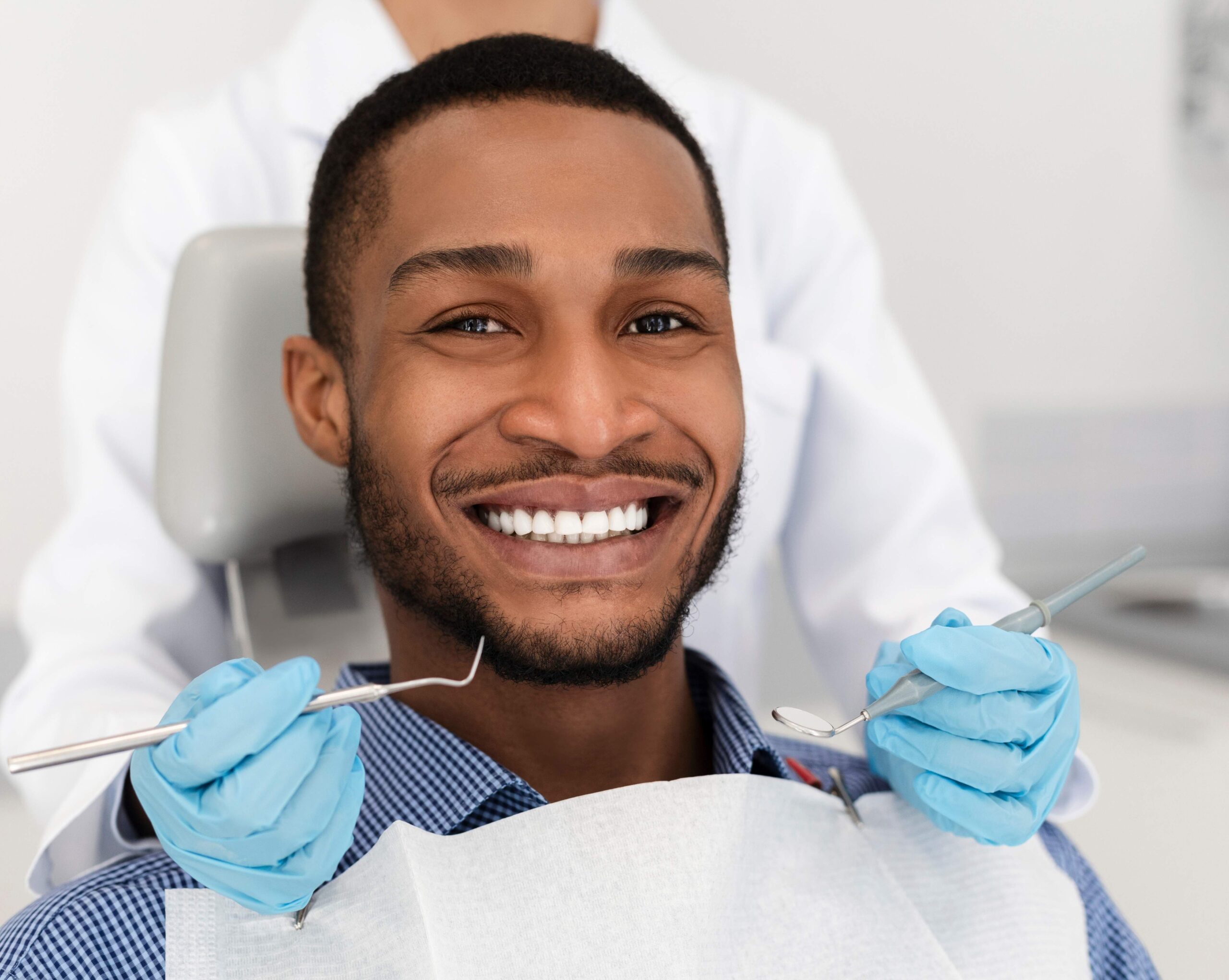 Handsome African American Man at dentist office