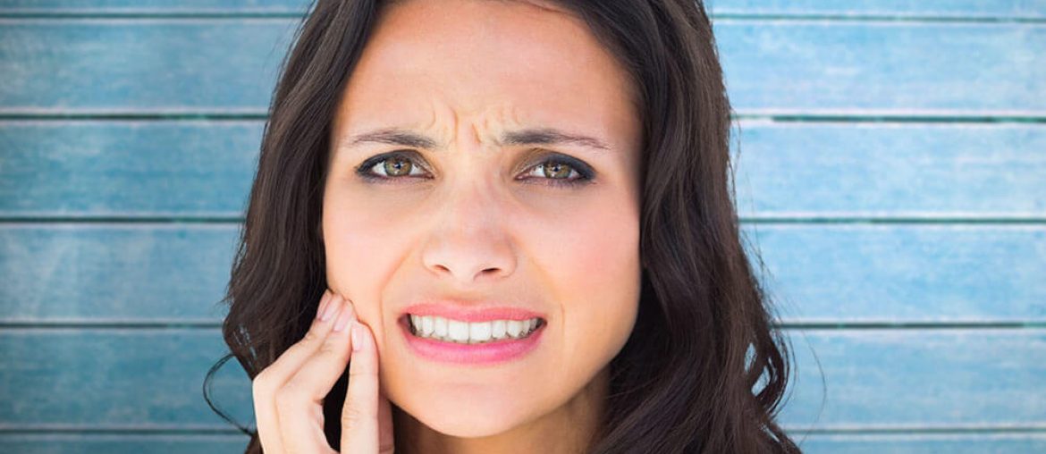 Woman having toothache