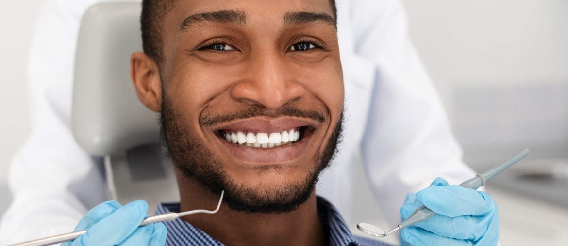 Handsome African American Man at dentist office