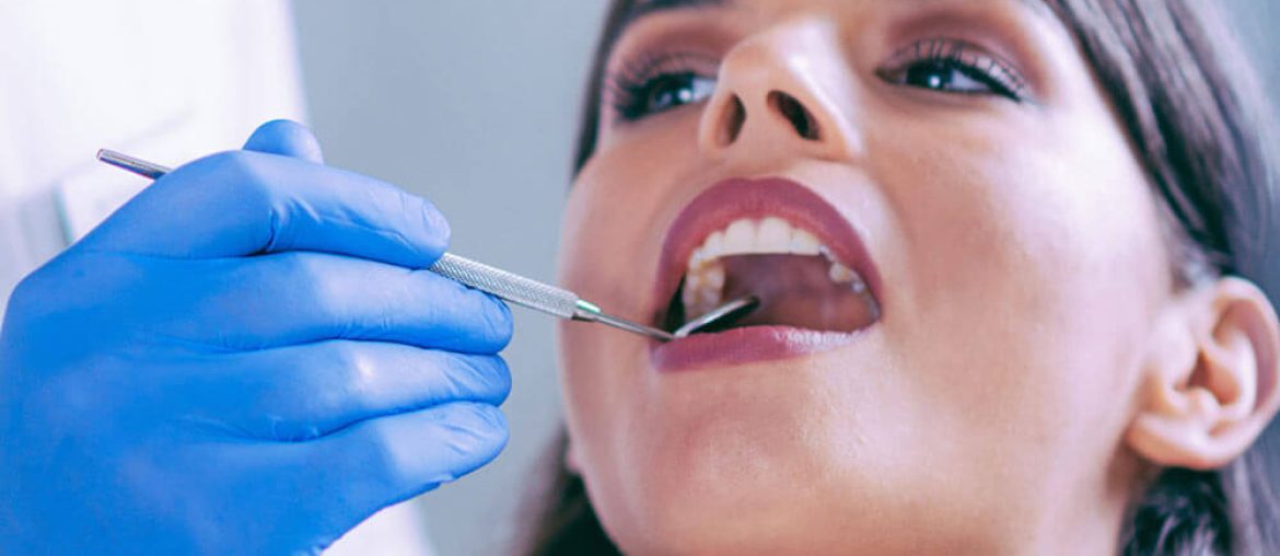 Woman getting dental treatment