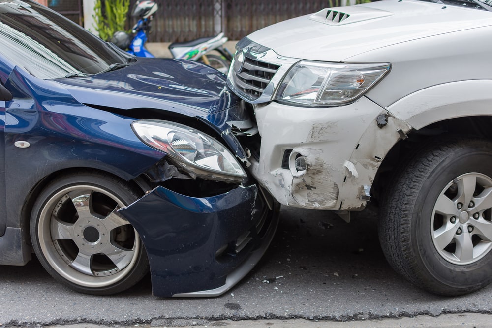 Car crash from car accident on the road in a city