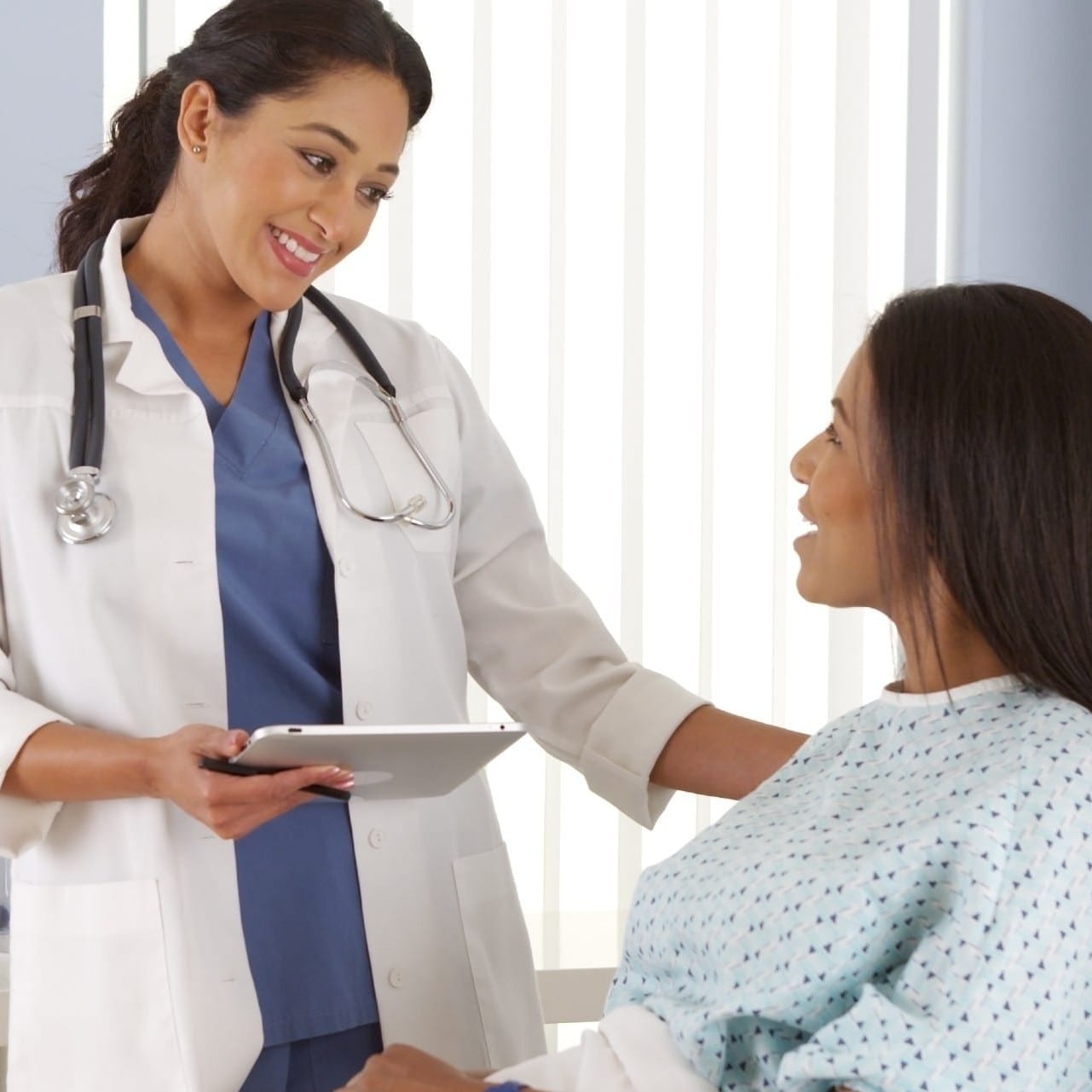 female doctor talking to patient