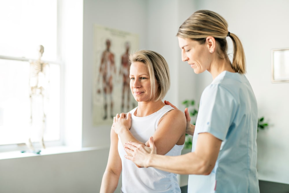 Woman in Physical Therapy for Elbow