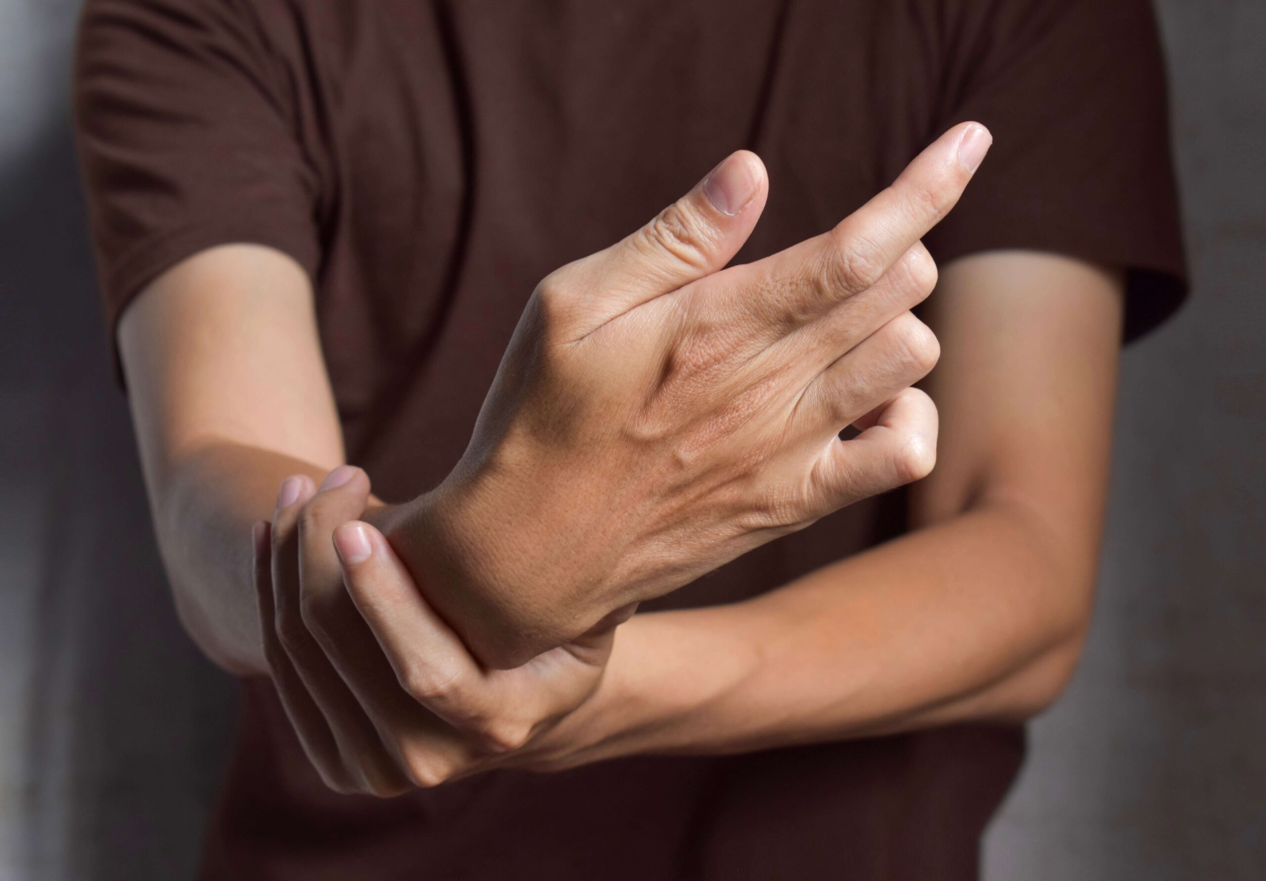 Man Holding Wrist