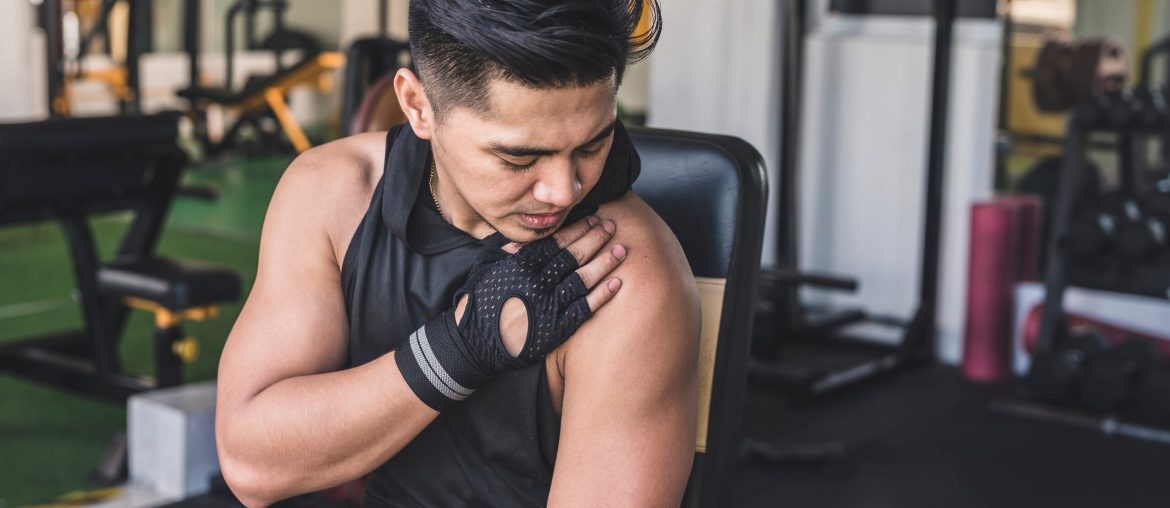 Young Man Bothered By Shoulder