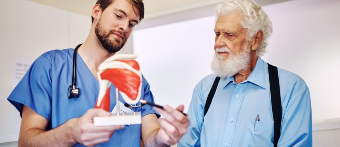 Anatomy,,Model,And,Doctor,With,Mature,Patient,For,Demonstration,For