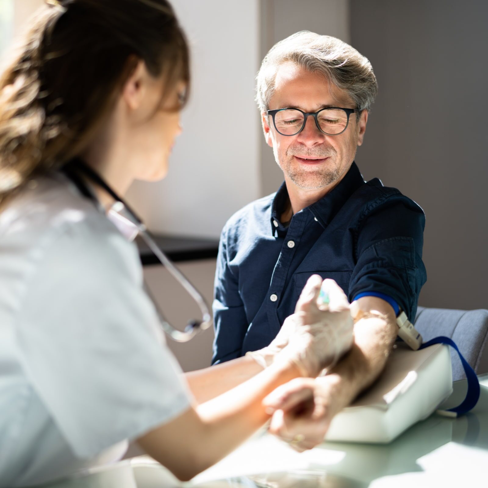 Patient Blood Draw by Doctor