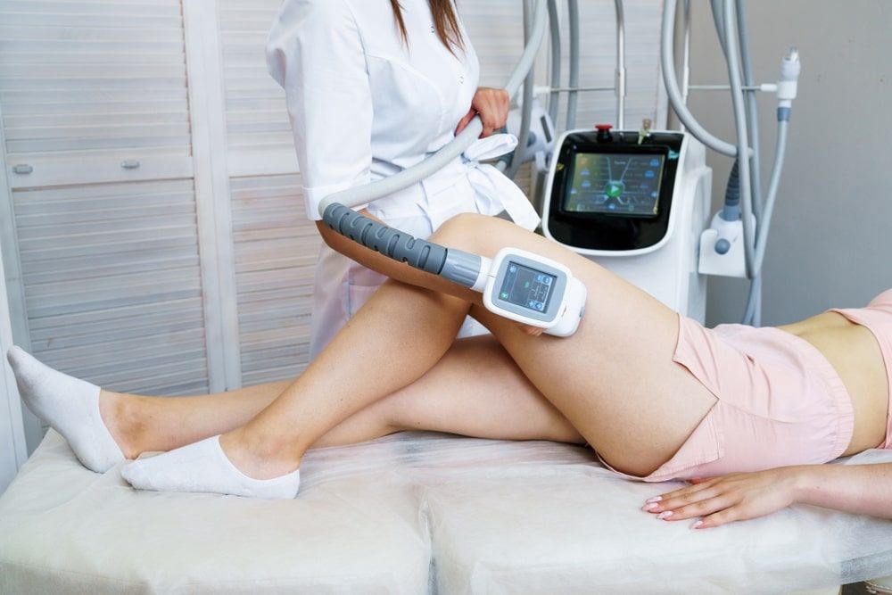 Woman receiving treatment for cellulite