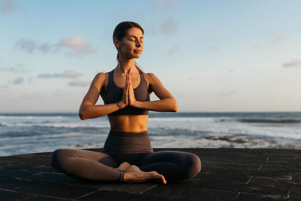 A woman taking advantage of meditation for anti-aging
