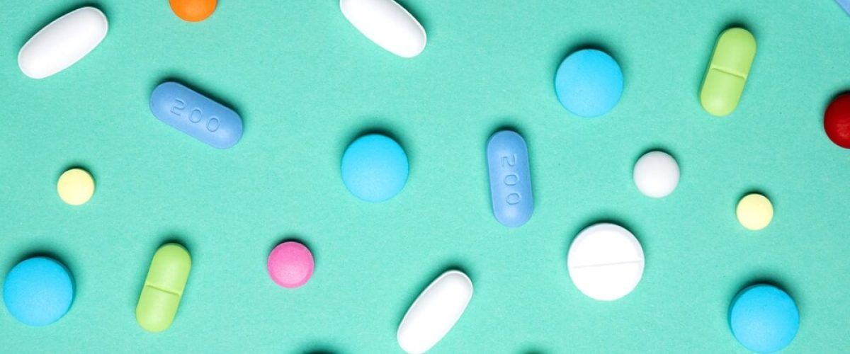 Creative layout of colorful pills