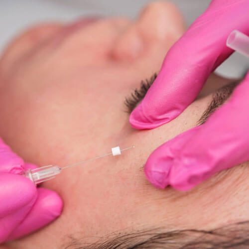 Woman having brow lift treatment