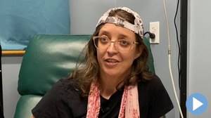 Screenshot of a female patient from a video review