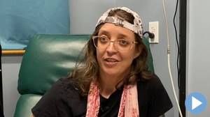 Screenshot of a female patient from a video review