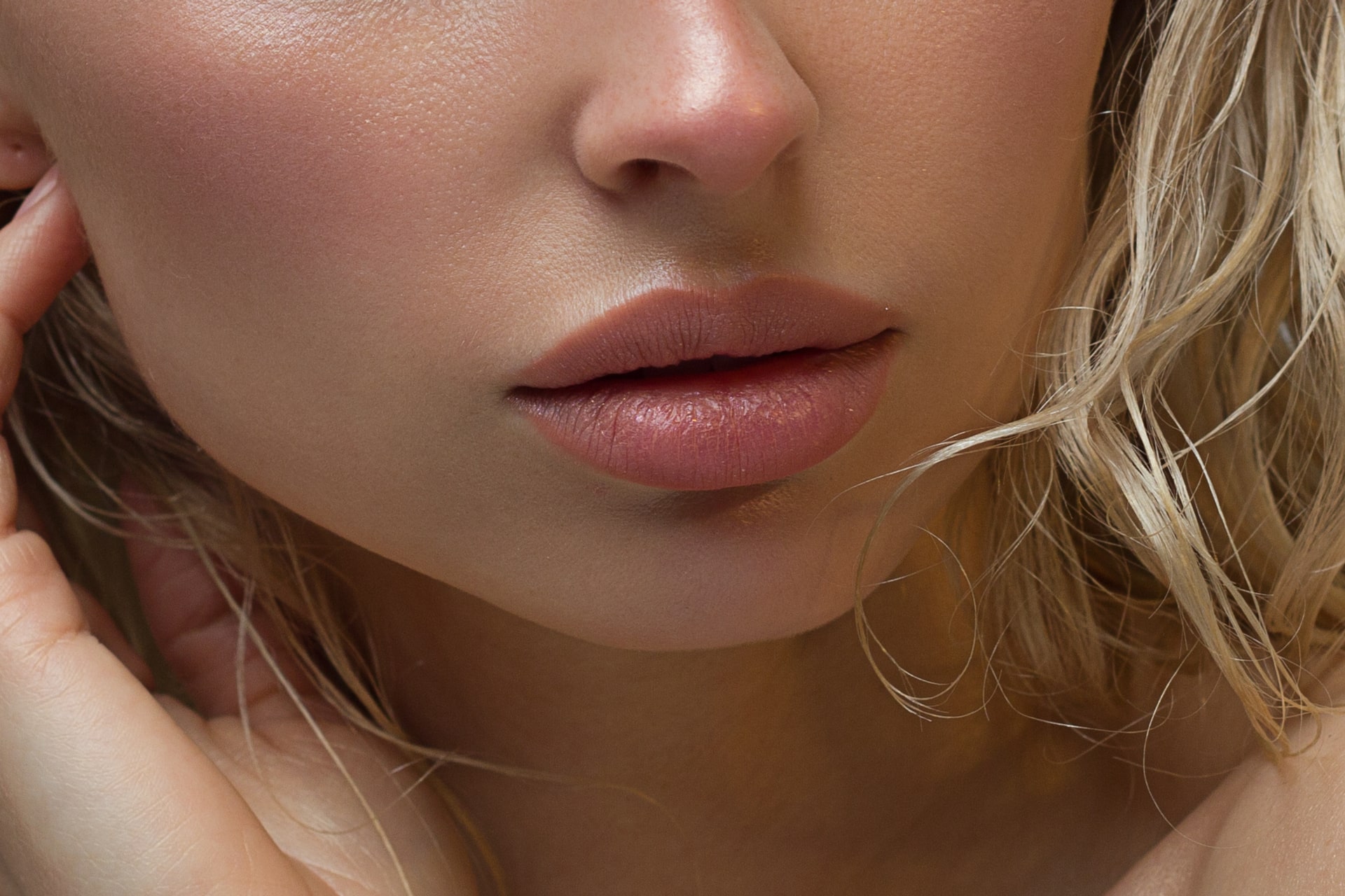 Natural gloss of lips and woman's skin