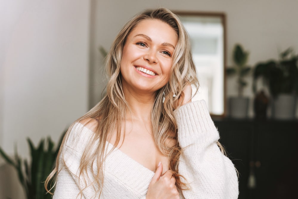 Blonde smiling woman 35 year clean fresh face