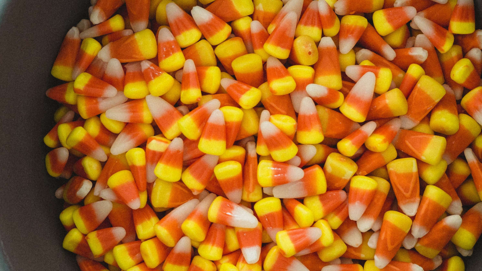 Plate with tasty Halloween candies