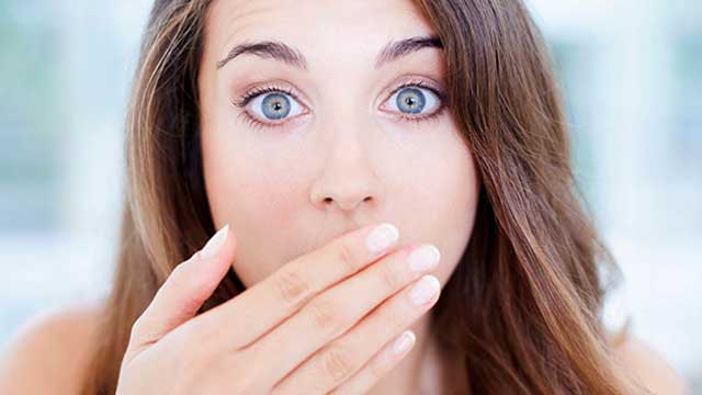 Surprised young woman portrait, beautiful emotional girl