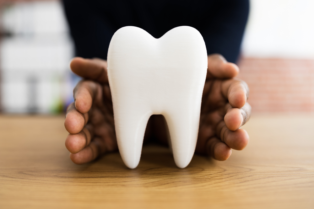 Dental,Tooth,Insurance,And,Replace,Enamel,Service.,African,American,Man