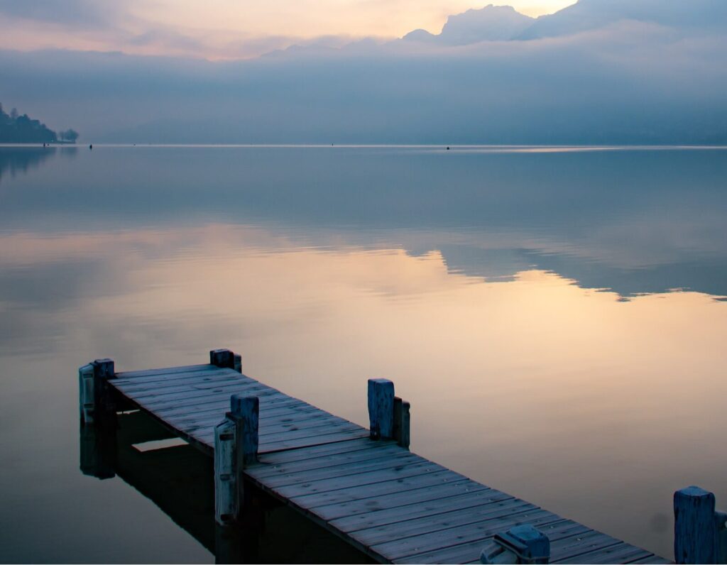 moment by the lake of annecy at sunrise