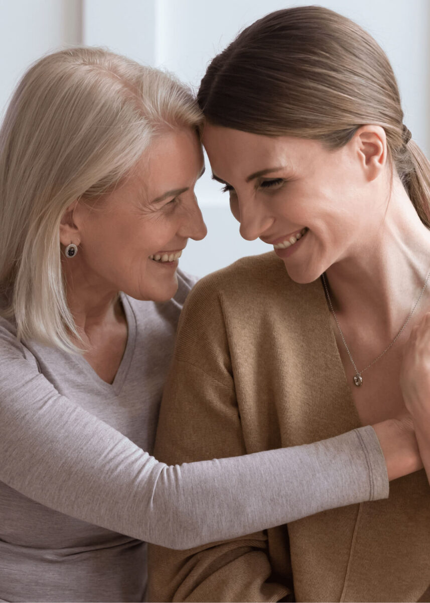 Mom and her adult child hugging during eating disorder therapy in Virginia.