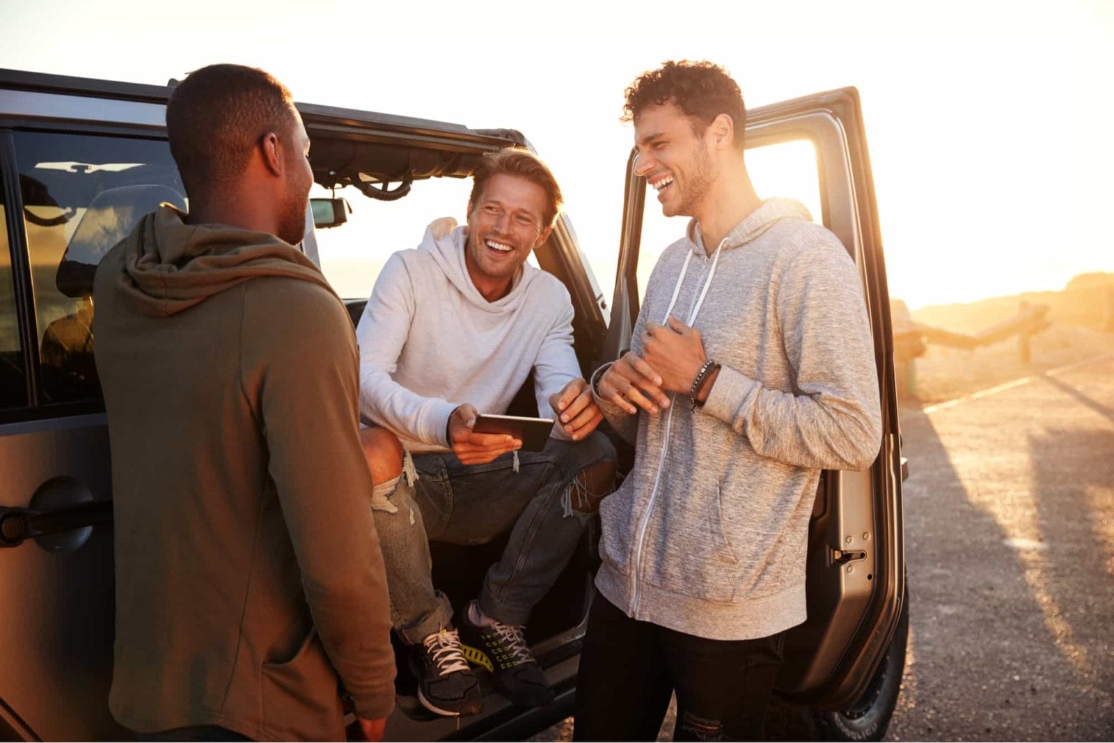 group of male friends having a road trip