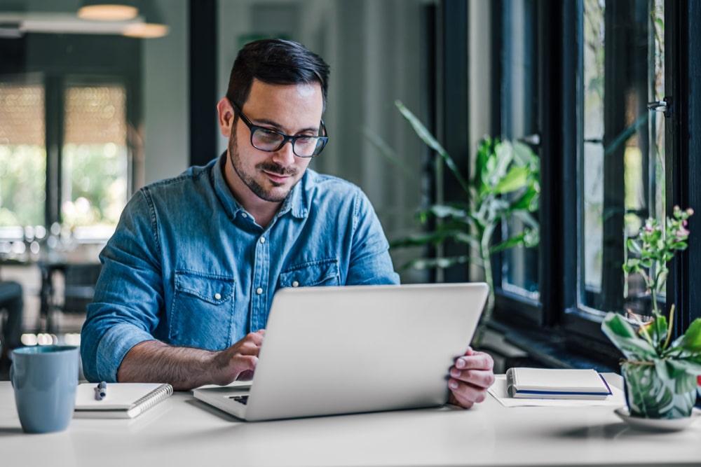 Man working in office laptop