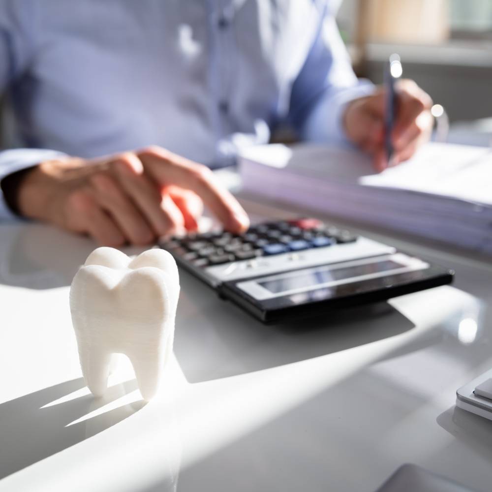 Tooth In Front Of man Calculating Bill