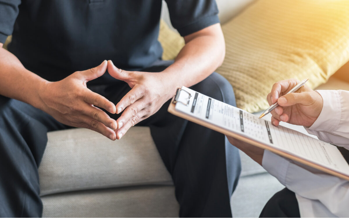 Male patient having consultation with doctor