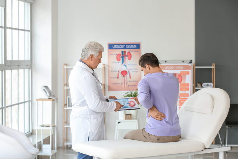 Young man visiting urologist in clinic