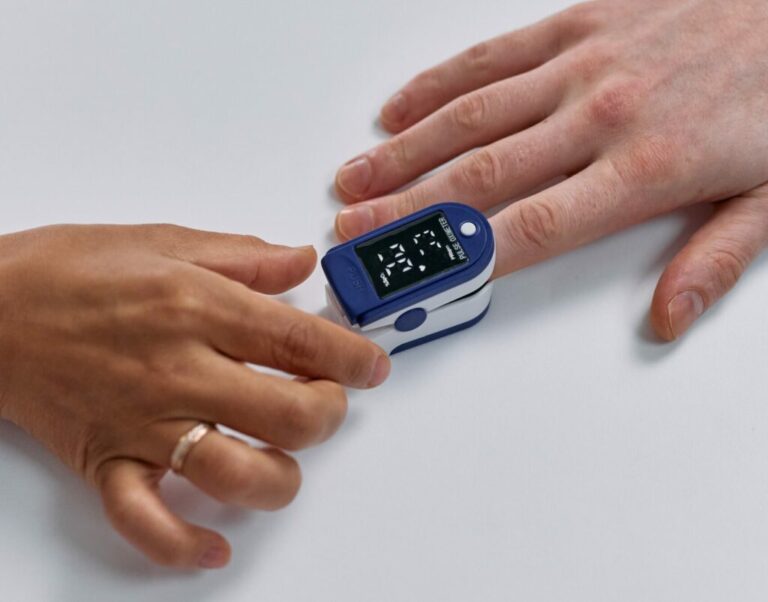 Doctor checking Blood pressure of a patient