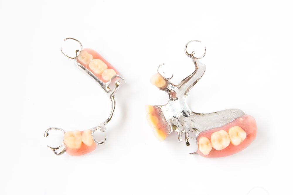 partial dentures on white background