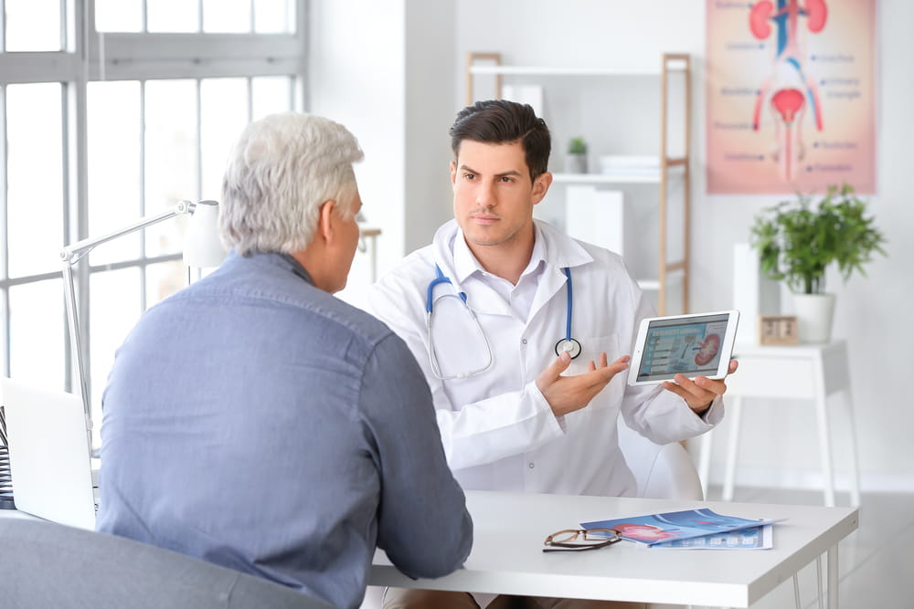 Senior man visiting urologist in clinic