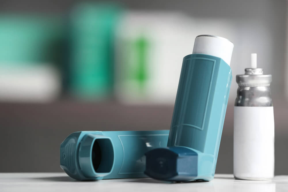 Asthma inhalers on table