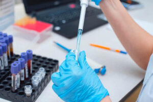 Laboratory assistant working with the dispenser