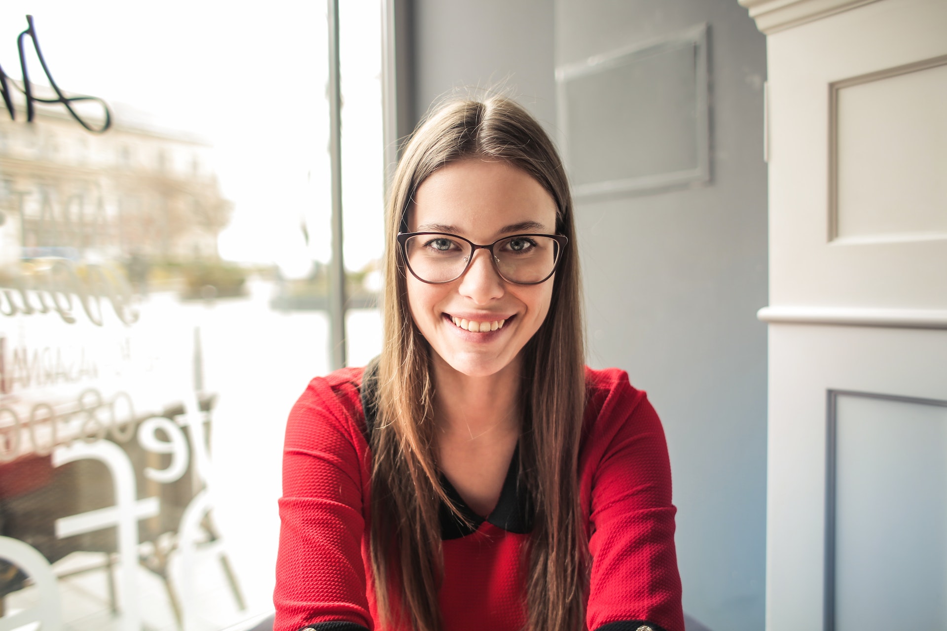 Brunette woman in red shirt