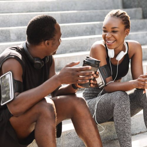 Fit Black Couple Taking Rest After Workout Outdoors