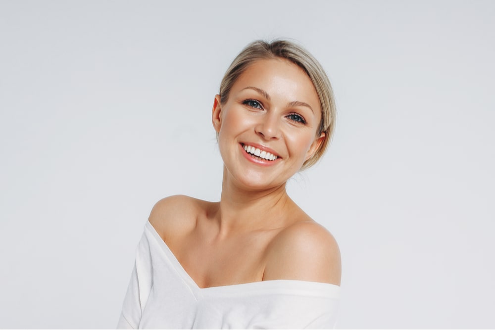 Beauty portrait of blonde smiling laughing woman